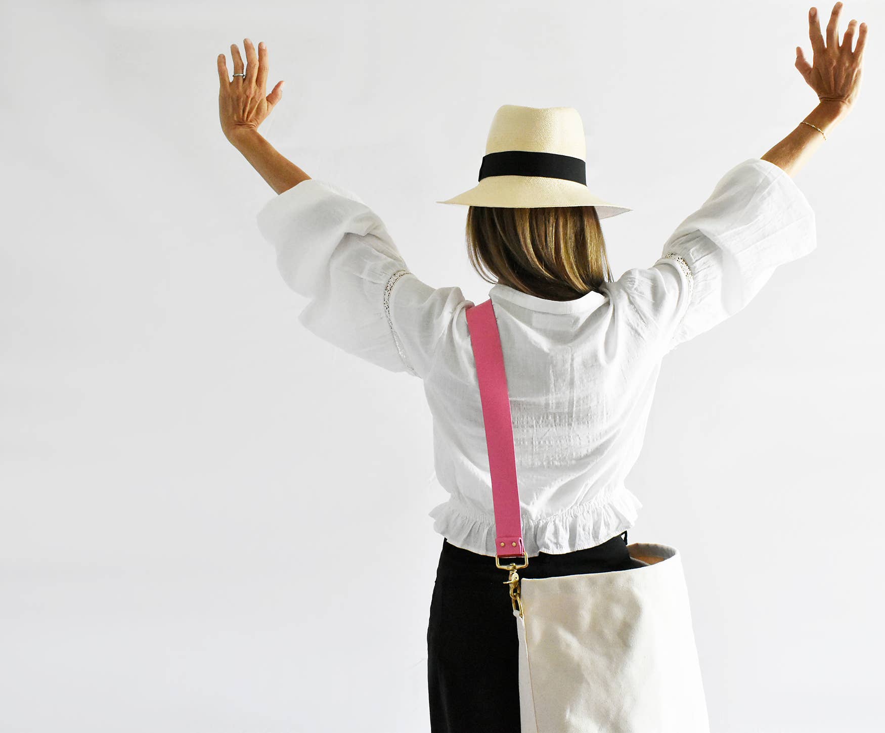A single green leaf against a white background.